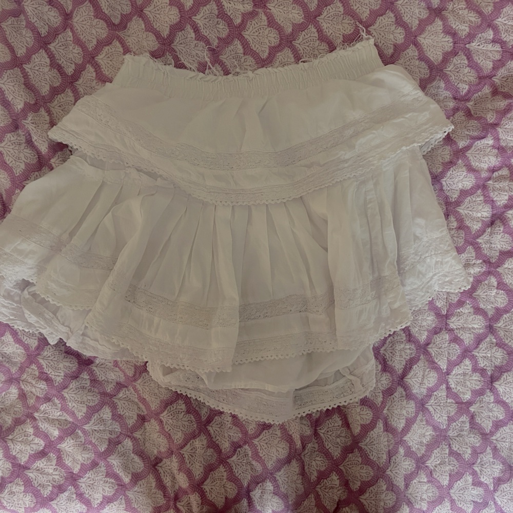light purple loveshackfancy ruffle skirt